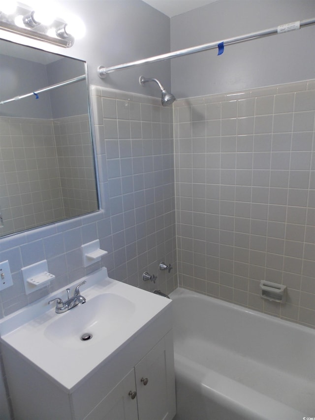 full bathroom with shower / bathtub combination and vanity