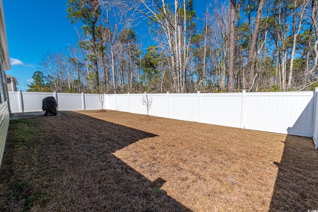 view of yard featuring a fenced backyard