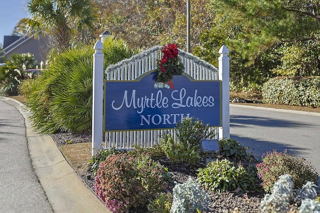 view of community sign