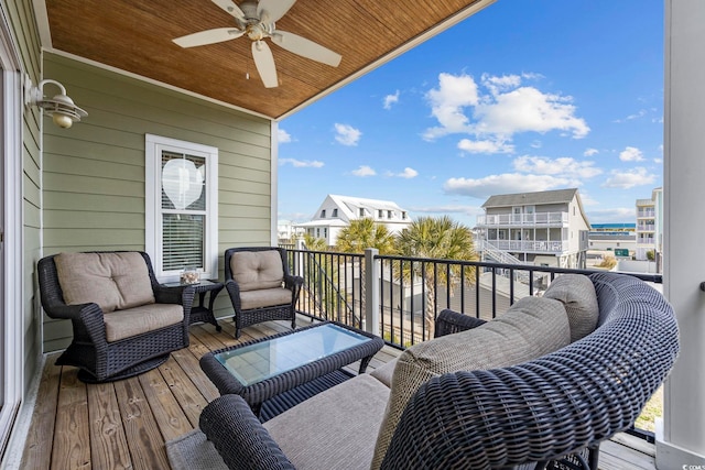 balcony featuring ceiling fan