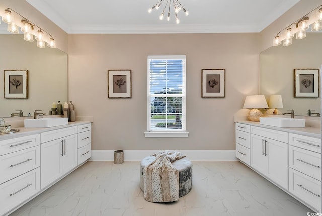 410 44th Ave N, Myrtle Beach, SC 29577 - full bathroom featuring two vanities, marble finish flooring, a chandelier, and ornamental molding
