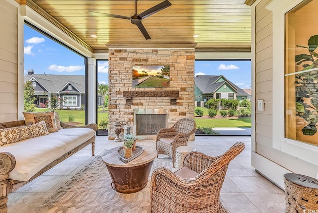 410 44th Ave N, Myrtle Beach, SC 29577 - view of patio with a ceiling fan and an outdoor living space with a fireplace
