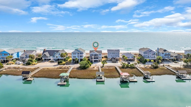 aerial view with a water view and a residential view