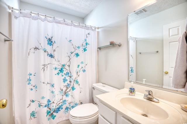 bathroom featuring visible vents, toilet, a textured ceiling, a shower with shower curtain, and vanity