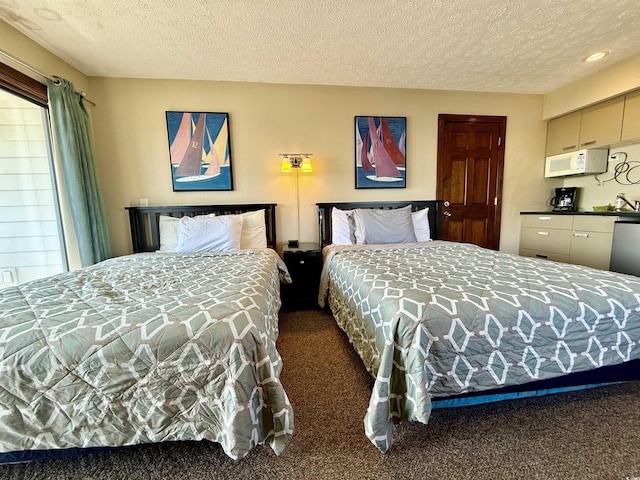 carpeted bedroom with a textured ceiling