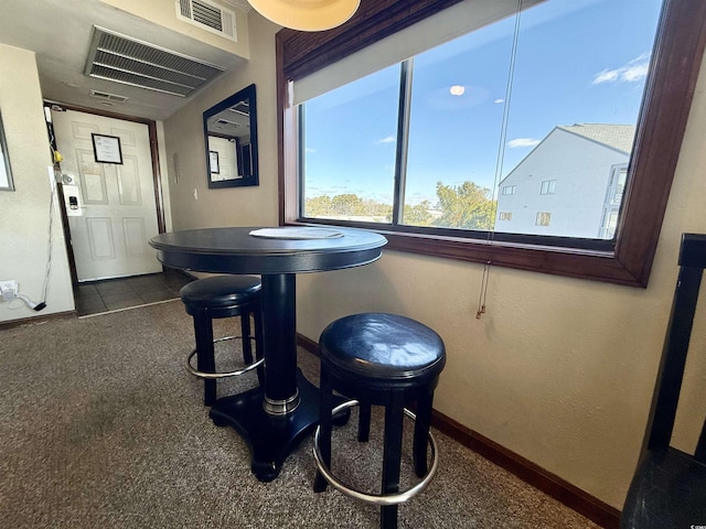 interior space with visible vents and baseboards