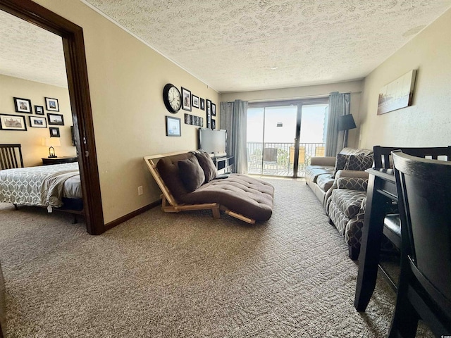 interior space with carpet floors, access to outside, a textured ceiling, and baseboards