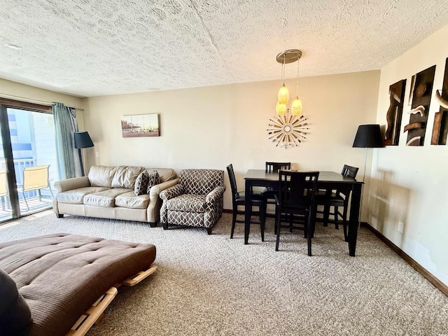 carpeted living room with a textured ceiling and baseboards