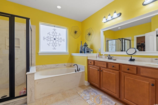 full bathroom with double vanity, a bath, tile patterned floors, a shower stall, and a sink