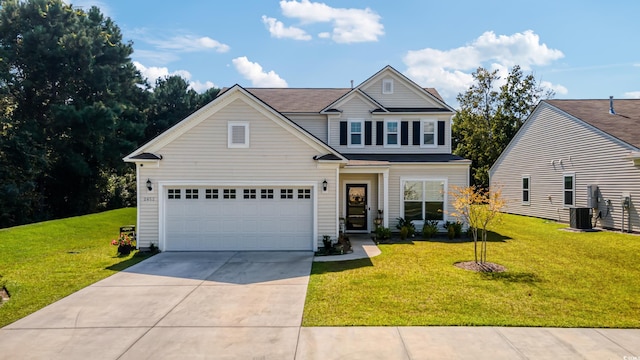 traditional-style house featuring a garage, central AC, a front lawn, and concrete driveway