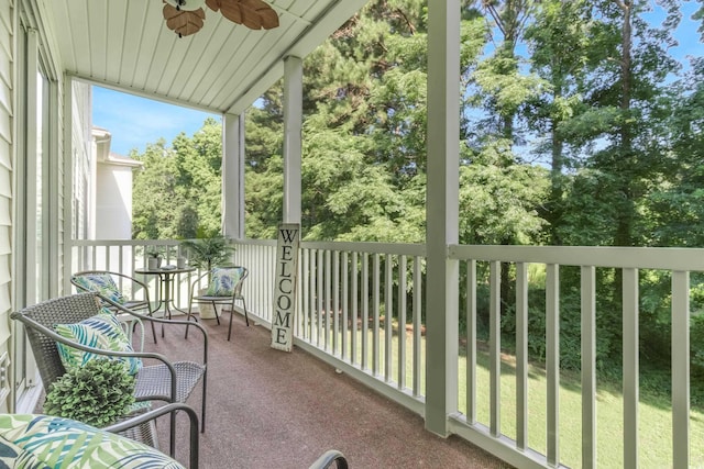 balcony featuring ceiling fan