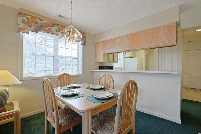 dining area with visible vents, baseboards, vaulted ceiling, dark carpet, and a chandelier