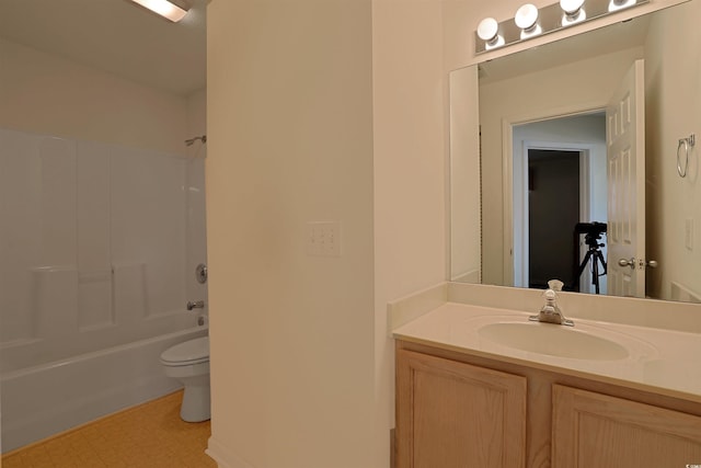 full bathroom with tile patterned floors, toilet, vanity, and shower / bath combination