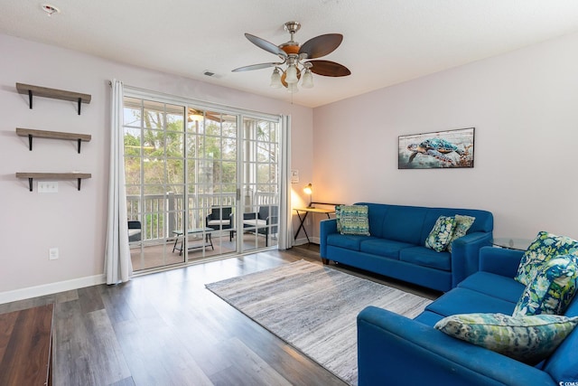 5801 Oyster Catcher Dr Unit 724, North Myrtle Beach, SC 29582 - living area featuring a ceiling fan, wood finished floors, and baseboards