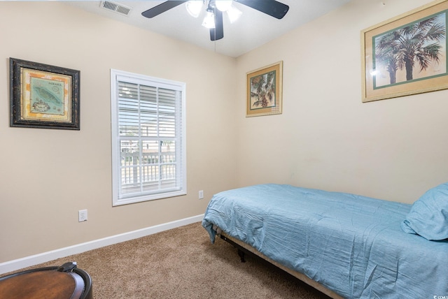 5801 Oyster Catcher Dr Unit 724, North Myrtle Beach, SC 29582 - bedroom featuring carpet flooring, baseboards, and a ceiling fan