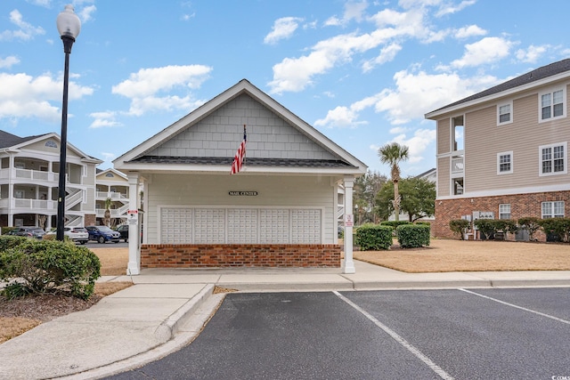 5801 Oyster Catcher Dr Unit 724, North Myrtle Beach, SC 29582 - surrounding community with mail area and uncovered parking