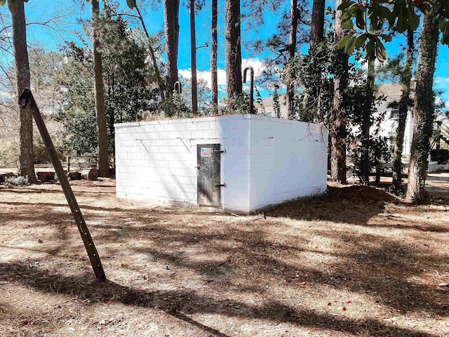 view of storm shelter with an outdoor structure