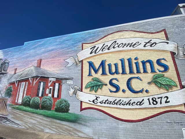 view of community sign