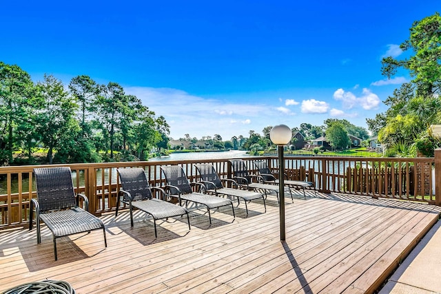 deck featuring a water view