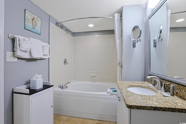 bathroom with recessed lighting, shower / bathing tub combination, a textured ceiling, vanity, and tile patterned floors