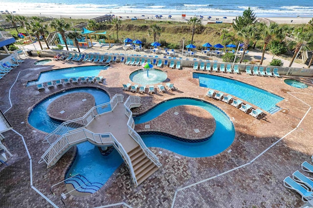 birds eye view of property with a view of the beach