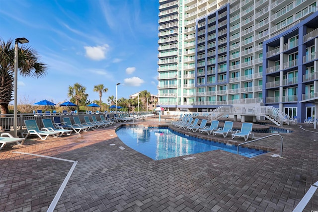 pool with a patio