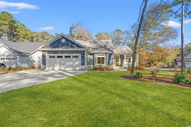 ranch-style house with an attached garage, driveway, and a front yard