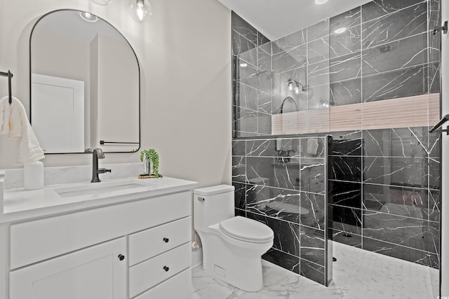 bathroom with toilet, marble finish floor, a marble finish shower, and vanity