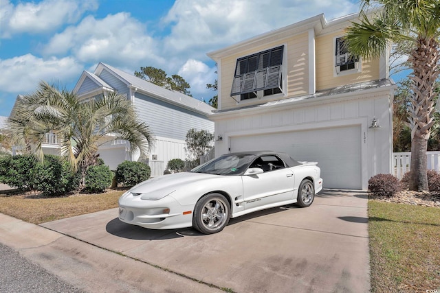 view of front of home featuring a garage and concrete driveway