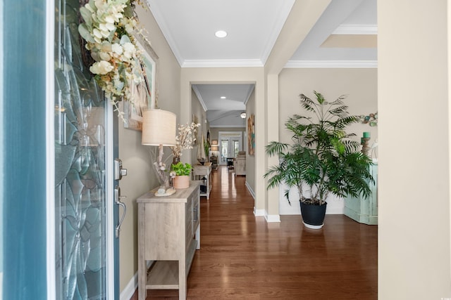 foyer with baseboards, ornamental molding, wood finished floors, and recessed lighting