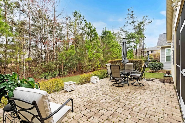 view of patio featuring outdoor dining space