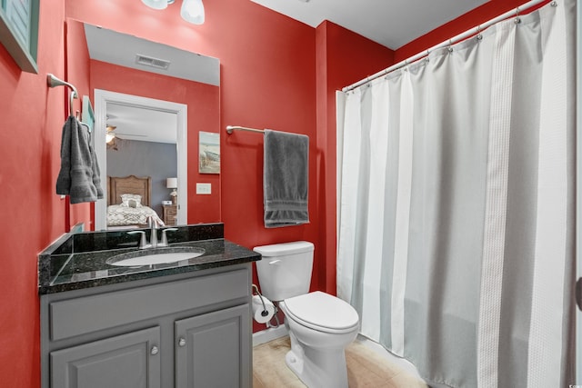 bathroom featuring visible vents, toilet, ensuite bath, tile patterned floors, and vanity