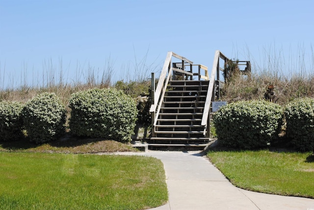 view of community featuring stairs