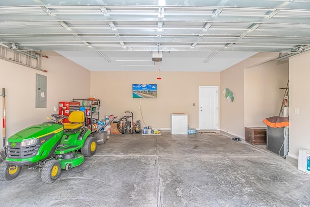 garage featuring electric panel and a garage door opener