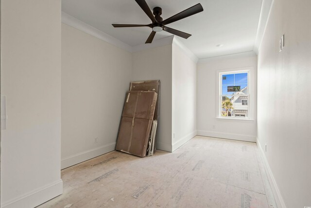 unfurnished bedroom featuring visible vents, ornamental molding, a ceiling fan, and baseboards