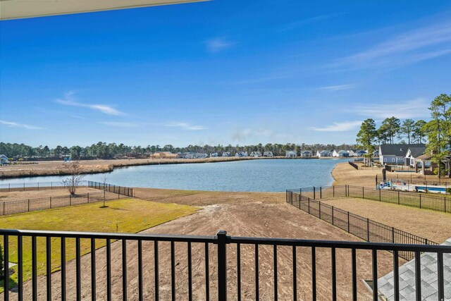 water view featuring fence