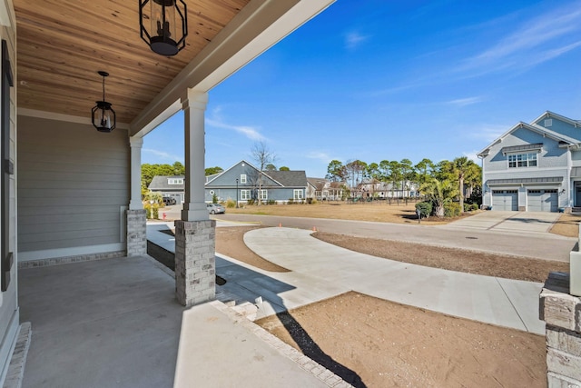 view of patio / terrace with a residential view