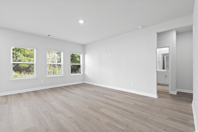 2104 Copper Creek Ct, Longs, SC 29568 - empty room with visible vents, recessed lighting, light wood-type flooring, and baseboards