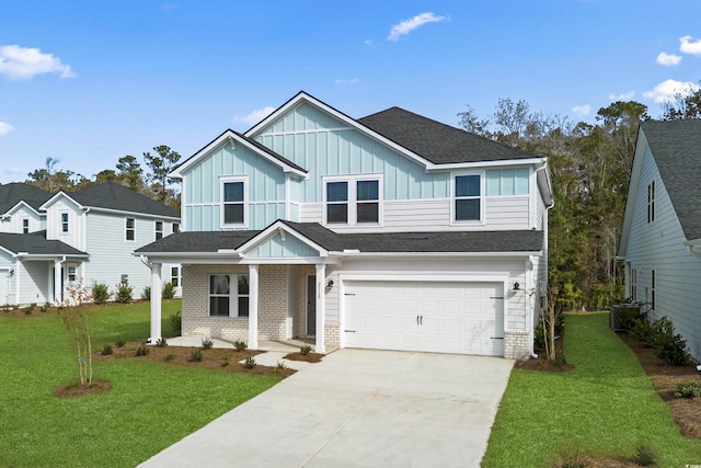 2104 Copper Creek Ct, Longs, SC 29568 - view of front of house with an attached garage, a front lawn, concrete driveway, board and batten siding, and brick siding