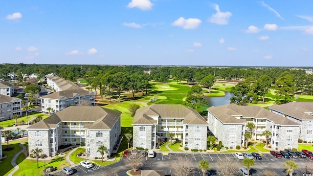 bird's eye view with golf course view and a water view