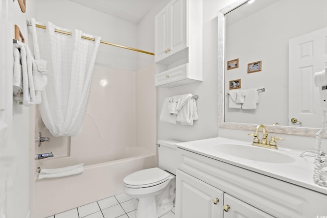 bathroom with toilet,  shower combination, vanity, and tile patterned flooring