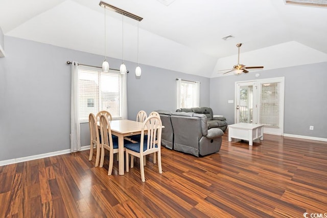 dining area featuring vaulted ceiling, wood finished floors, visible vents, and baseboards