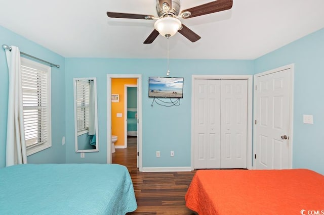 bedroom with a ceiling fan, a closet, baseboards, and dark wood-type flooring