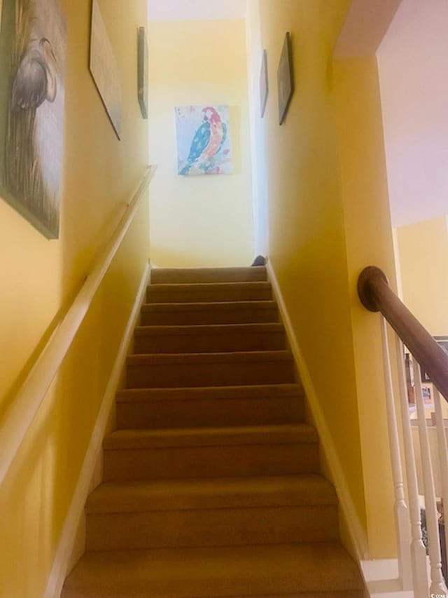 1575 Berkshire Ave, Myrtle Beach, SC 29577 - staircase with baseboards