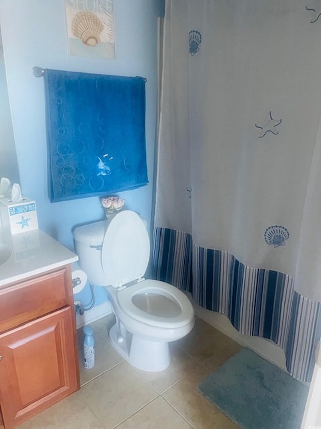 1575 Berkshire Ave, Myrtle Beach, SC 29577 - bathroom with tile patterned floors, toilet, and vanity