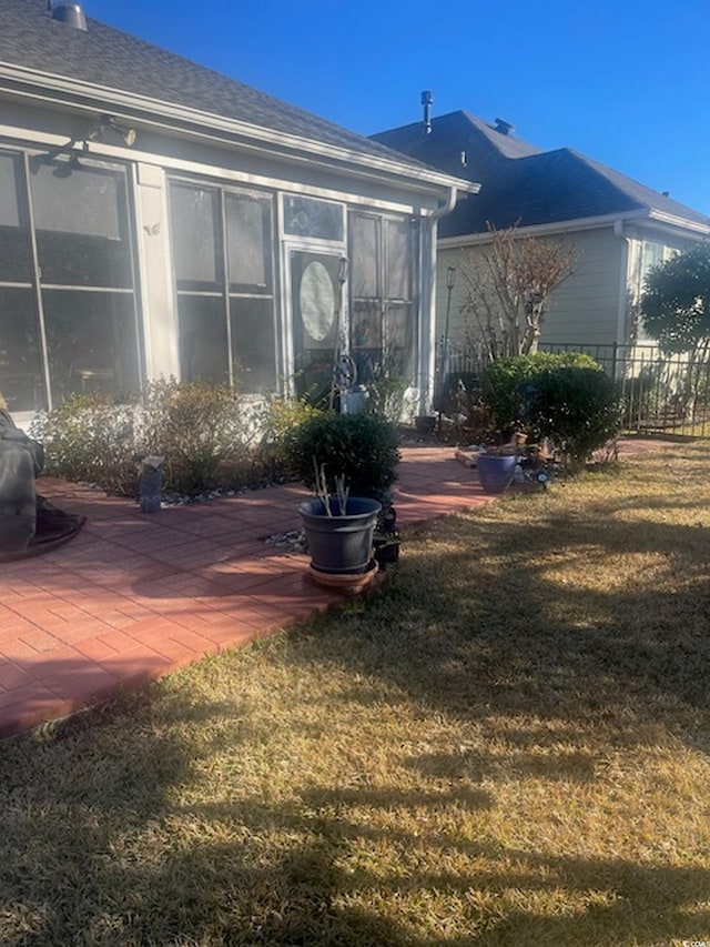 1575 Berkshire Ave, Myrtle Beach, SC 29577 - back of property featuring a sunroom and a patio