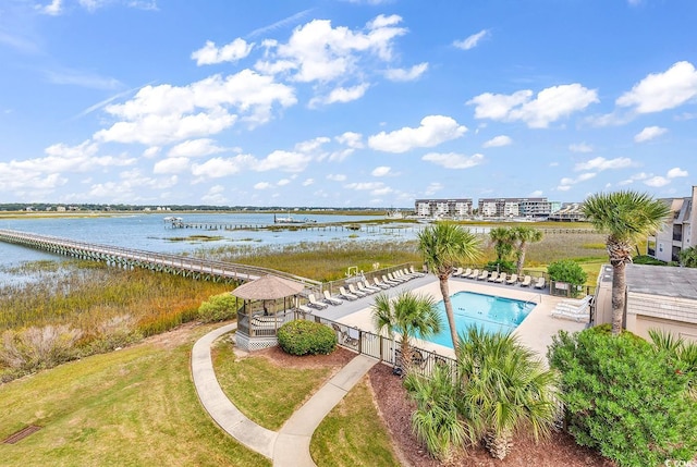 birds eye view of property featuring a water view