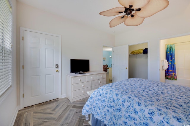 bedroom featuring ceiling fan and a closet