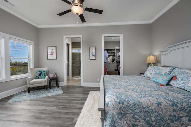 bedroom with visible vents, crown molding, and baseboards