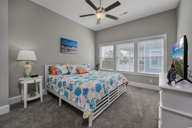 bedroom featuring ceiling fan, carpet floors, visible vents, and baseboards